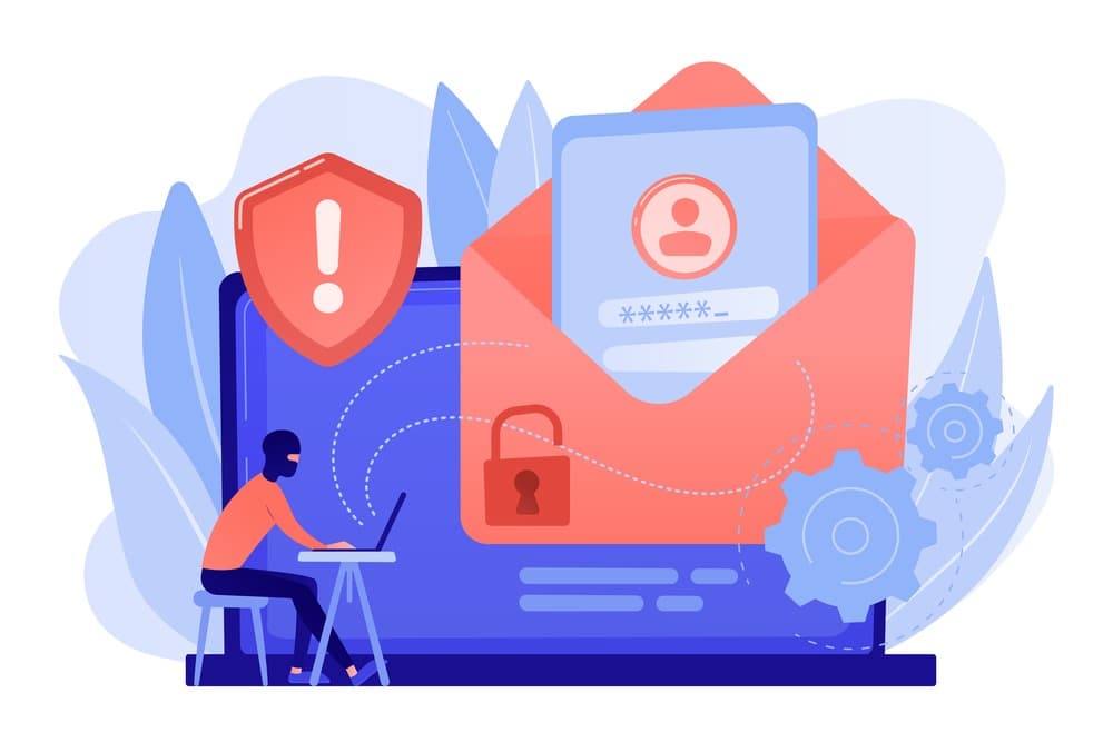 Hình minh họa một hacker đang ngồi làm việc với máy tính trước một màn hình lớn hiển thị phong bì thư đã bị mở