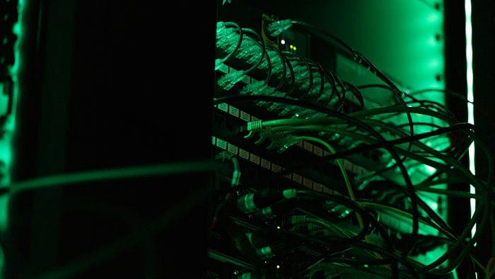 A server rack full of intranet and internet connection. The image reference to Post-Quantum Cryptography Connection.